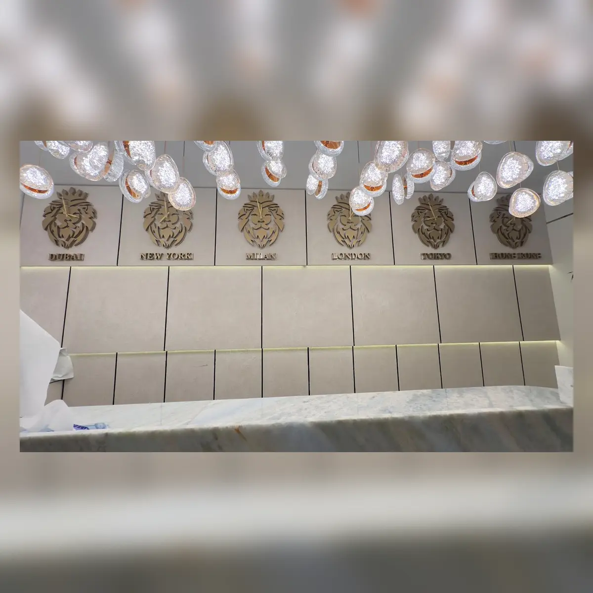Custom wall clock installation in a Dubai commercial interior